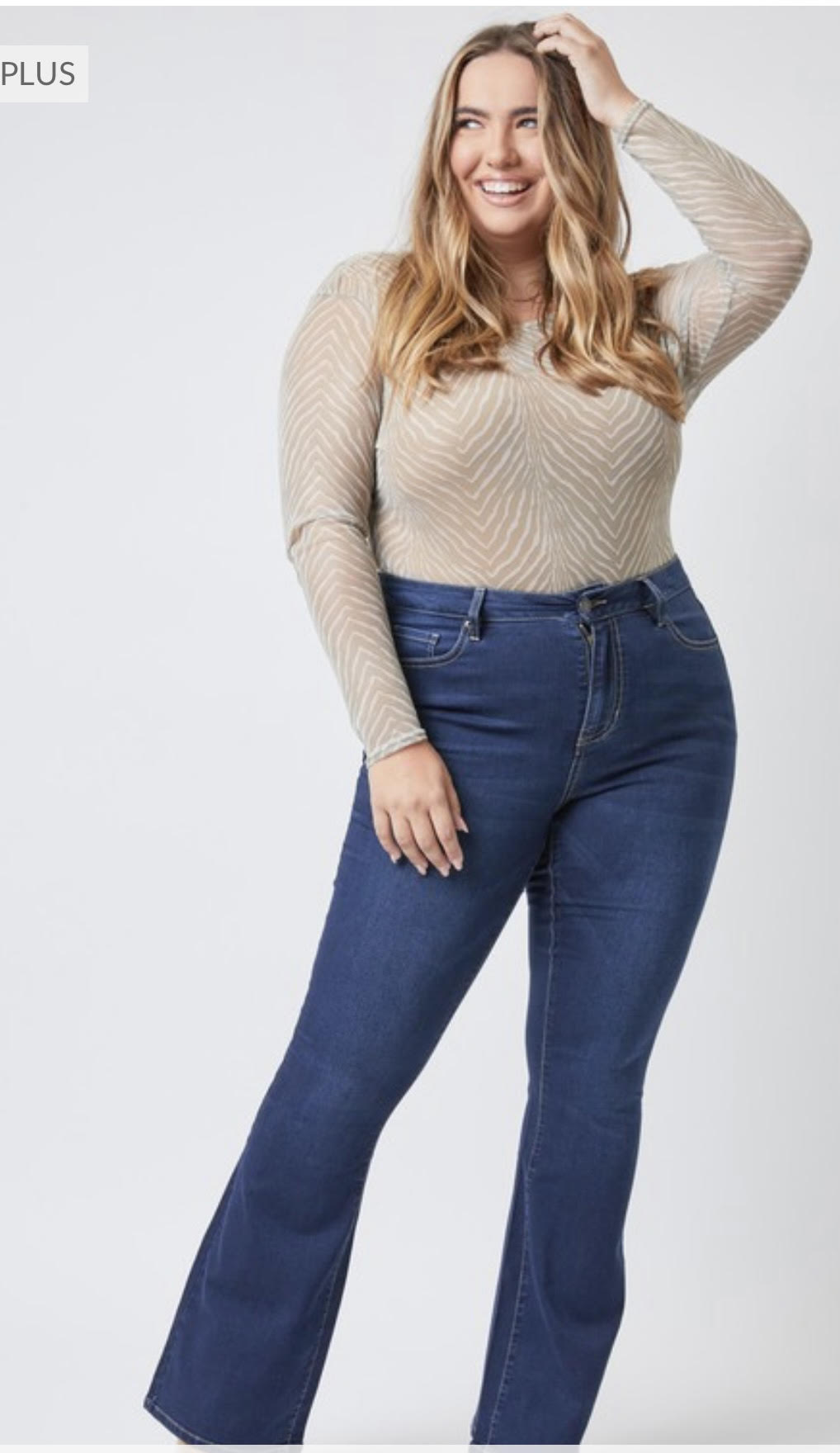 Plus size denim that is a super soft, stretchy, flare jean ready to move when you are. 5 pocket construction, single close button and the perfect fit to your body